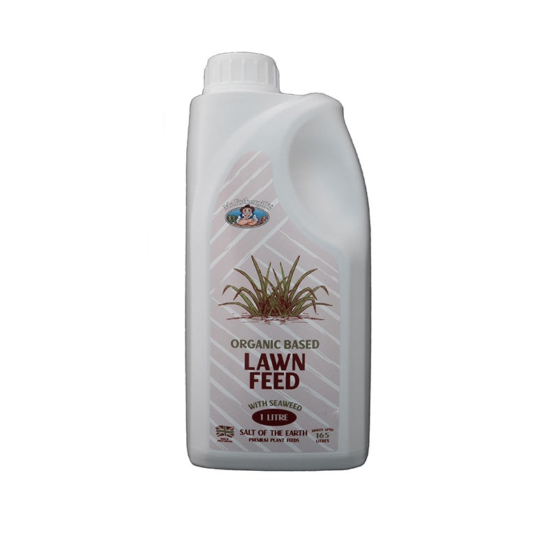 White bottle of organic lawn feed on a white background